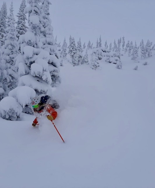 Skiing deep powder at Stellar Heliskiing in British Columbia, Canada.